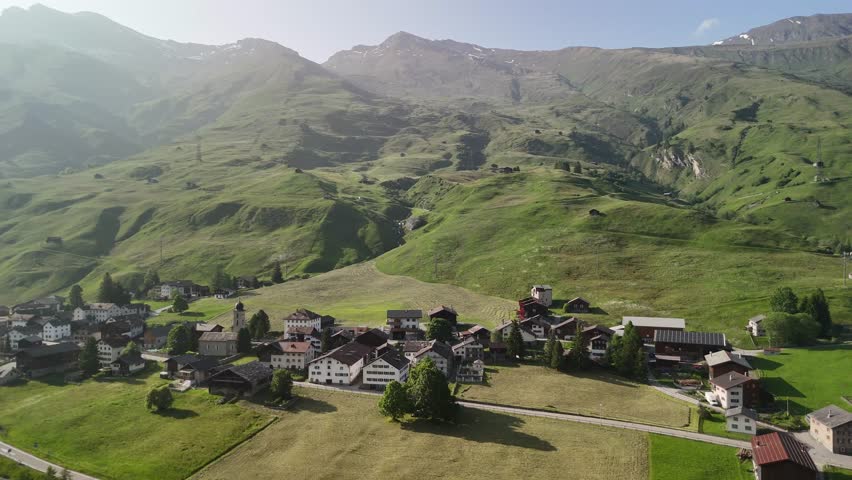 Scenic Aerial View of countryside and Lush Green Hills and Alpine Landscape in Rheinwald, Nufenen, Switzerland