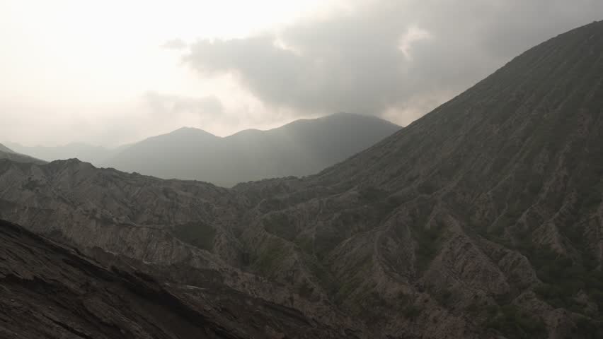 Empty volcanic landscape active volcanic crater Mount Bromo Java Indonesia sulfur hot steam