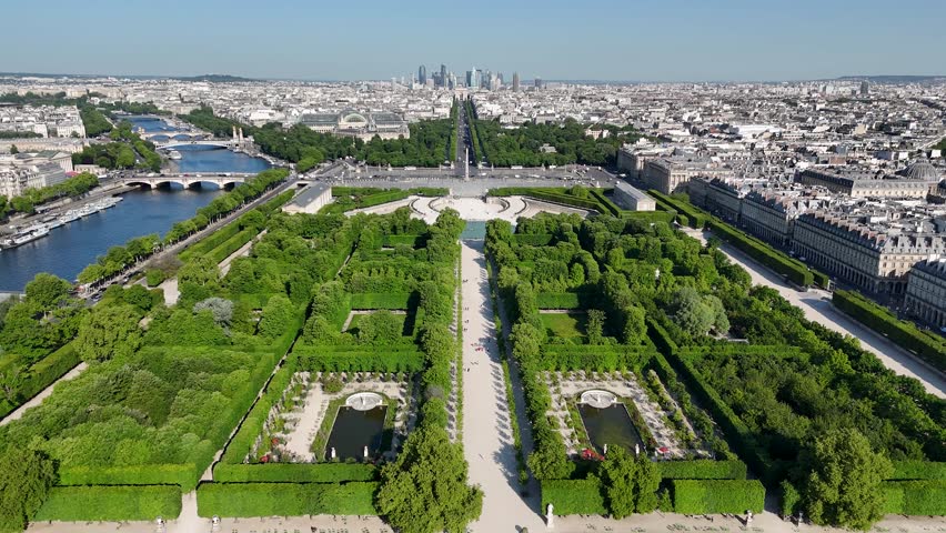 Champs Elysees Avenue At Paris Ile De France In France. Triumphal Arch. Paris Skyline Scene. Champs Elysees Avenue At Paris In Ile De France France. Beautiful Tuileries Garden. Tourism Landmark.