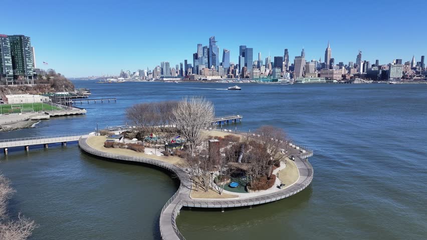 Hudson River Walkway At Jersey City In New Jersey United States. Downtown District. New York Skyline Scene. Hudson River Walkway At New Jersey United States. Walkway Landscape.