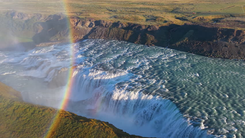 Aerial Views of a Majestic Waterfall Gullfoss Accompanied by a Rainbow. Iceland