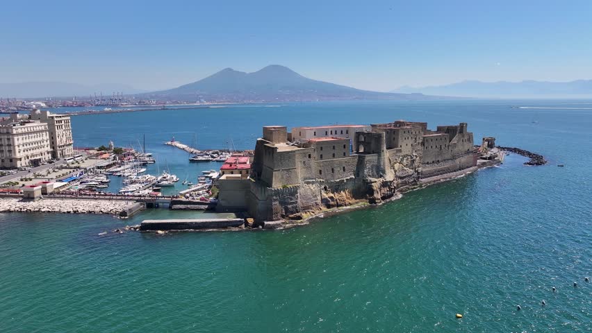 Dell Ovo Castle At Naples In Campania Italy. Downtown Cityscape. Gulf Of Naples Landscape. Dell Ovo Castle At Naples In Campania Italy. Medieval Castle. Skyline Medieval Building. Italy Landscape.