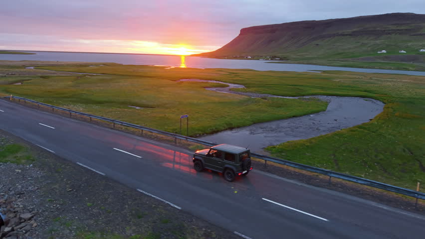 Car Through Iceland Landscape mountains Epic Scenic Road Trip Scene. Kirkjufell