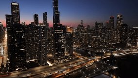 Sunset Chicago Skyline At Chicago In Illinois United States. Illuminated Downtown. Sunset City Landscape. Chicago At Illinois United States. Chicago City District. City Skyline Scene. - Powered by Shutterstock - Get 15% off with code: PIKWIZARD15