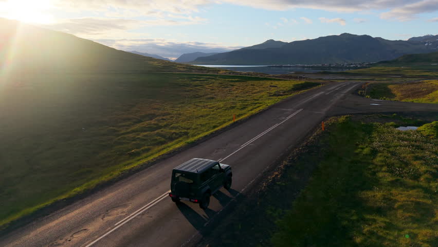 Car Through Iceland Landscape mountains Epic Scenic Road Trip Scene. Kirkjufell