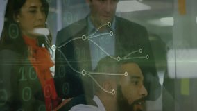 Team assembling around clear wall for data science planning, binary overlay driving diagram edits. Collaboration, brainstorming, innovation, technology, analysis, strategy, teamwork - Powered by Shutterstock - Get 15% off with code: PIKWIZARD15