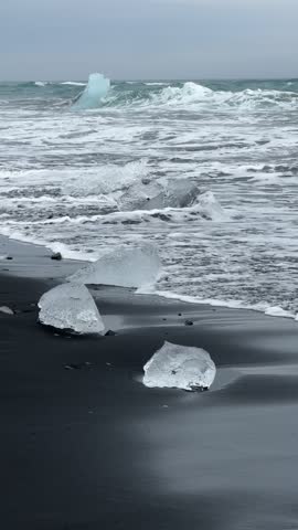 Crystalline ice shards lie scattered across Diamond Beach