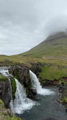Kirkjufell, Iceland’s iconic Arrowhead Mountain from Game of Thrones, with Kirkjufellsfoss waterfall below. A cinematic and dramatic natural landmark in Snæfellsnes.