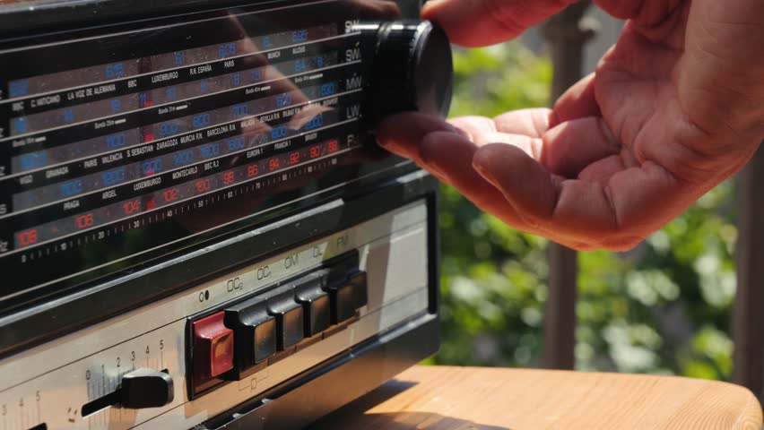 Old Retro AM FM Radio with tubes, Hand Changing stations , bulb vintage music player.