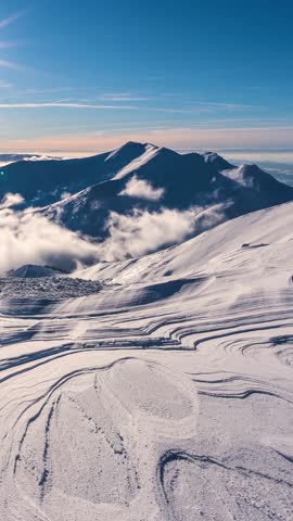 Vertical Panorama of Sunset in Winter Alps Mountains Misty Landscape