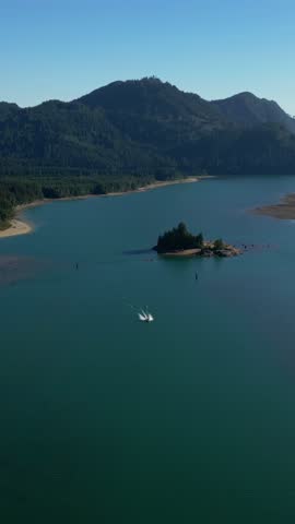 Jet Ski Speeding Across a Serene Mountain Lake in Beautiful British Columbia, Canada