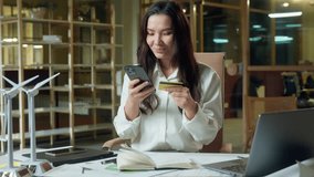 Asian business woman Chinese businesswoman pay money credit card banking mobile phone green screen in office Korean Japanese girl happy buyer shopping online crypto payment internet bank chroma key - Powered by Shutterstock - Get 15% off with code: PIKWIZARD15