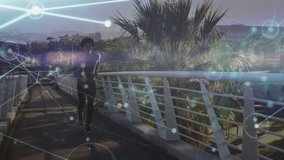 Runner switching from jogging to sprinting on bridge by palms with network overlay connecting nodes. Urban, technology, fitness, innovation, motion, connectivity, lifestyle - Powered by Shutterstock - Get 15% off with code: PIKWIZARD15