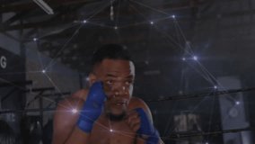 Boxer shifting stance in ring while network overlay mapping punches and guiding training. Athletic, digital, futuristic, combat, power, concentration, technology - Powered by Shutterstock - Get 15% off with code: PIKWIZARD15