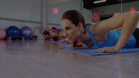 Instructor cuing participants doing fitness push-ups on mats with animated light trails swirling. Fitness, group, exercise, wellness, animation, motivation, sport - Powered by Shutterstock - Get 15% off with code: PIKWIZARD15