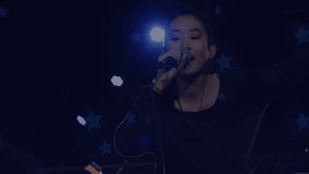 Closing eyes and gripping microphone, singer starting music while fans reaching under star lights. Performer, concert, stage, illumination, enthusiasm, audience, music - Powered by Shutterstock - Get 15% off with code: PIKWIZARD15