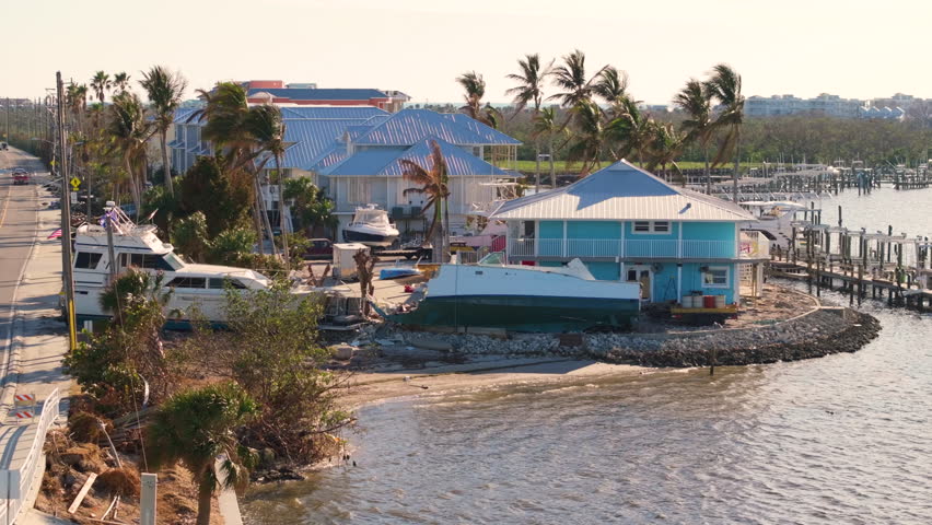 Heavily damaged sailing yachts after hurricane Milton in Englewood, Florida.