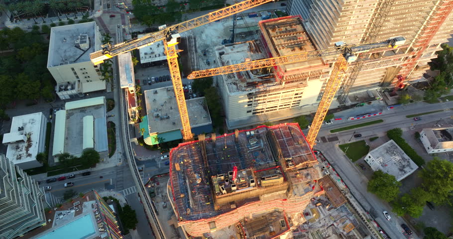 Miami, Florida urban landscape at sunset. Construction site of residential building.