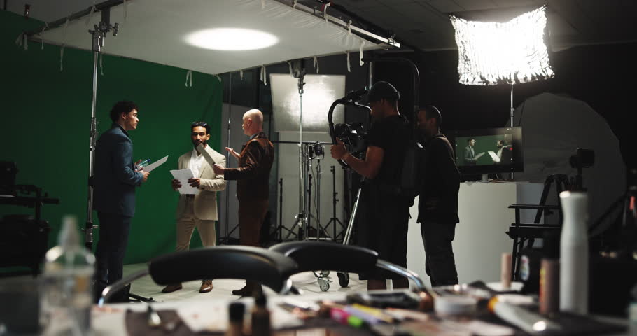Filming, producer and broadcast with people in studio for news anchor, production and record. Weather forecast, television and journalist media with cameraman and green screen on set for rehearsal