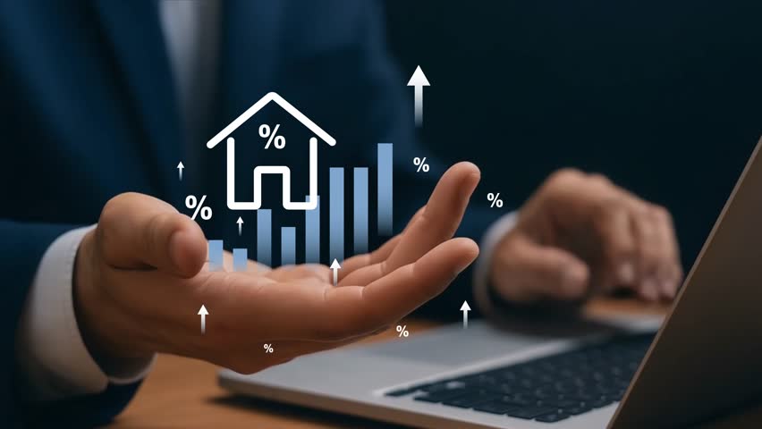 4k video, Real Estate Market Growth with Rising Interest Rates concept. Person holding virtual house icon with percentage symbols and rising bar graph, symbolizing real estate interest rates and marke