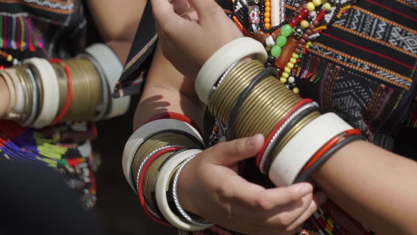 traditional Rung people attire and accessories close-up of hands