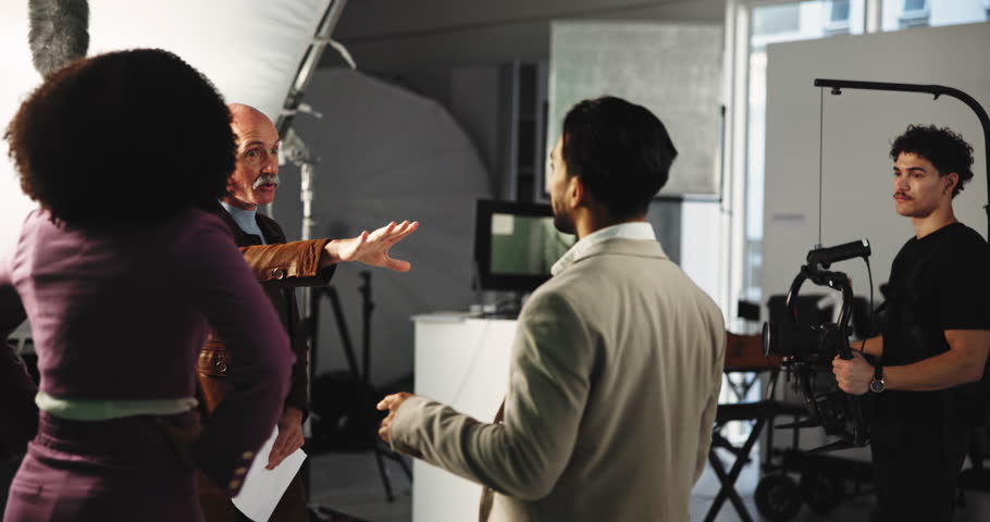 Angry actor, production team and people in studio for problem, poor script or bad writing. Frustrated group, set or behind the scenes for fail, scream or throw paper for performance anxiety or stress