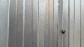 Close-up of metal sheet wall texture with metallic corrugated patterns and weathered industrial details. - Powered by Shutterstock - Get 15% off with code: PIKWIZARD15