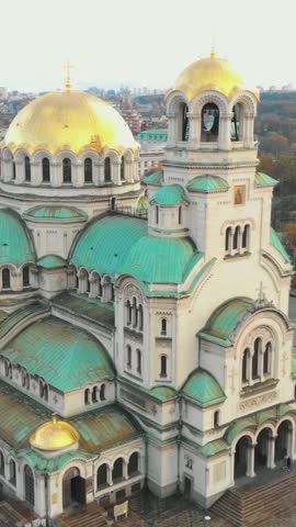 Aerial view of the magnificent Alexander Nevsky Cathedral in Sofia, Bulgaria, highlighting its stunning architecture and vibrant colors. Vertical Video