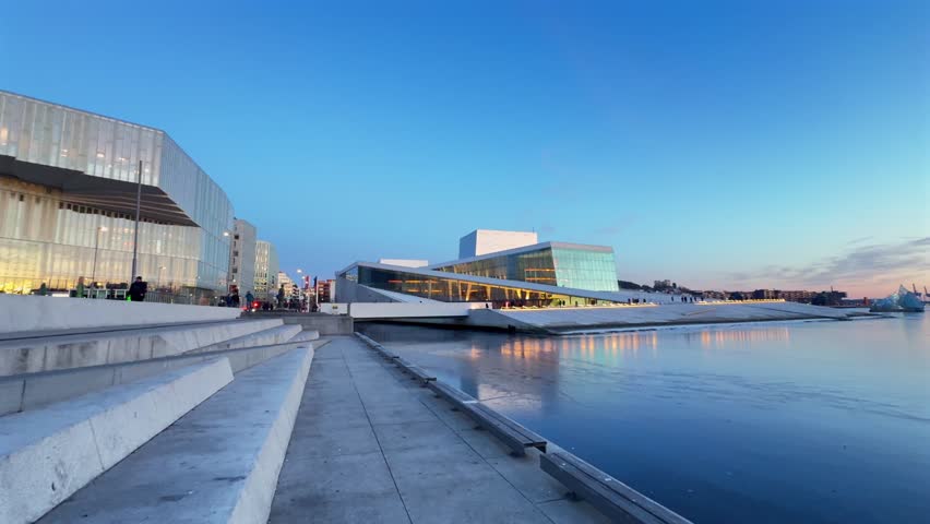Oslo library Opera House Norway Operahuset Norge aerial drone Norwegian Inner Oslo Fjord arctic vibrant golden hour sunset cityscape sauna icy frozen sea ocean breeze Munch Museum skybar pan right
