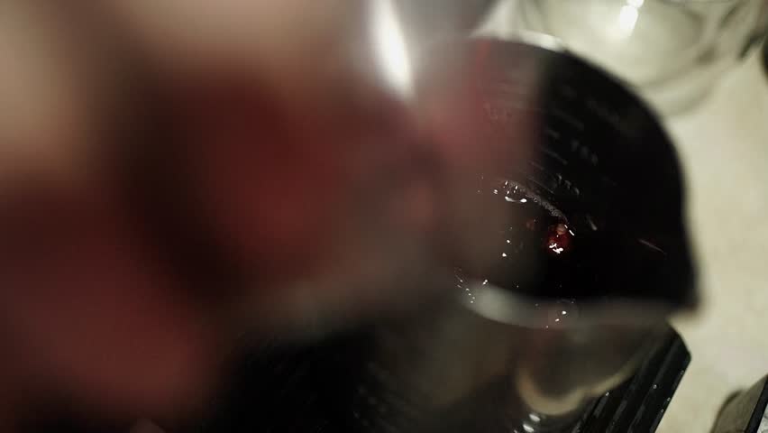 Slow Motion Adding Frozen Berries into Pitcher with Berry Infusion