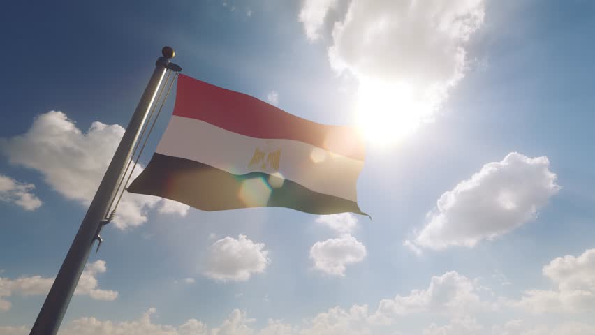 Egypt Flag on a Flagpole with a cloudy blue sky background