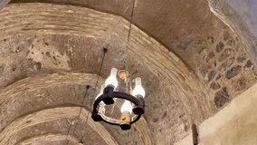 Chandelier in restaurant desert architectural design in Iran Persian Arabian culture of local ancient brick dome ceiling landmark historic interior decoration and vaulted roof religious vintage temple - Powered by Shutterstock - Get 15% off with code: PIKWIZARD15