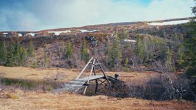 Man Walking And Carrying Oars In Åfjord, Norway - Wide Shot - Powered by Shutterstock - Get 15% off with code: PIKWIZARD15