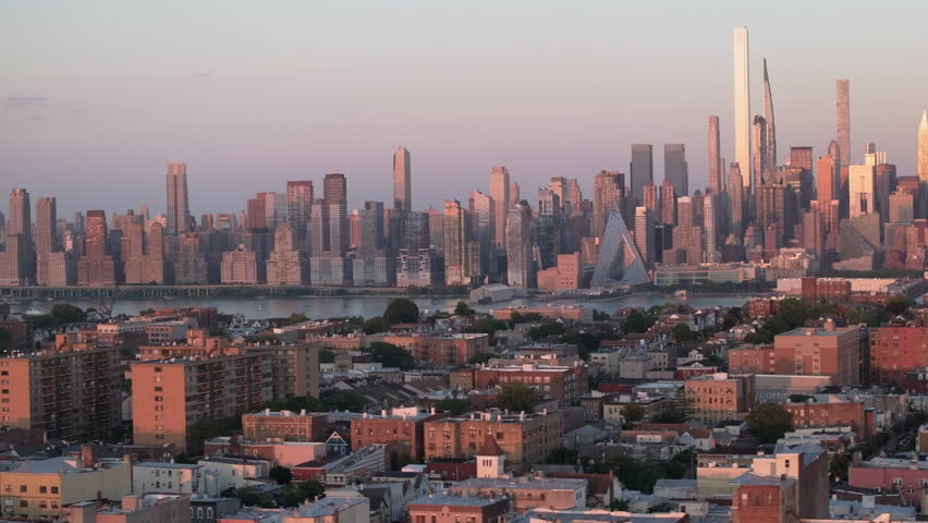 Aerial view of suburban New Jersey at dusk. Shot with the New York City skyline in the background.