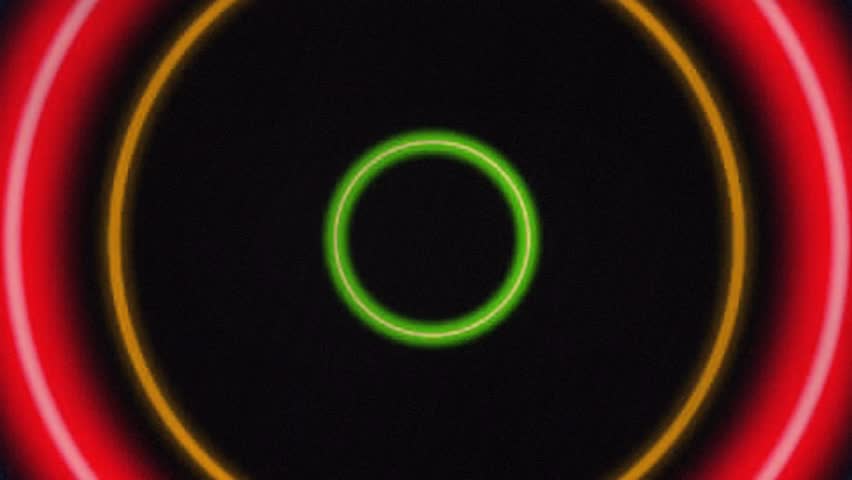 Retro Effect of Glowing neon concentric rings in Multiple colors on a black background. Circle shape digital abstract design with Vibrant colors. - Powered by Shutterstock - Get 15% off with code: PIKWIZARD15