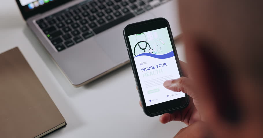 Hands, screen and man in office, smartphone and application for health insurance. Closeup, person and employee in workplace, cellphone and medical aid with wellness cover, app and online assessment
