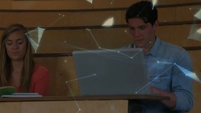 Students studying in lecture hall with drifting network overlay forming rotating globe above desks. Collaboration, innovation, digital, education, technology, future, academic - Powered by Shutterstock - Get 15% off with code: PIKWIZARD15