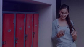 Teenage student leaning red school lockers receiving smartphone messages showing glowing overlay. Teenager, technology, digitalart, youthful, education, glow, interaction - Powered by Shutterstock - Get 15% off with code: PIKWIZARD15