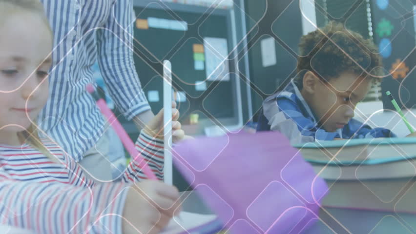 Teacher leaning over girl writing workbook in classroom and showing tablet content in education. Educational, mentoring, learning, collaborative, motivational, youthful, academic - Powered by Shutterstock - Get 15% off with code: PIKWIZARD15