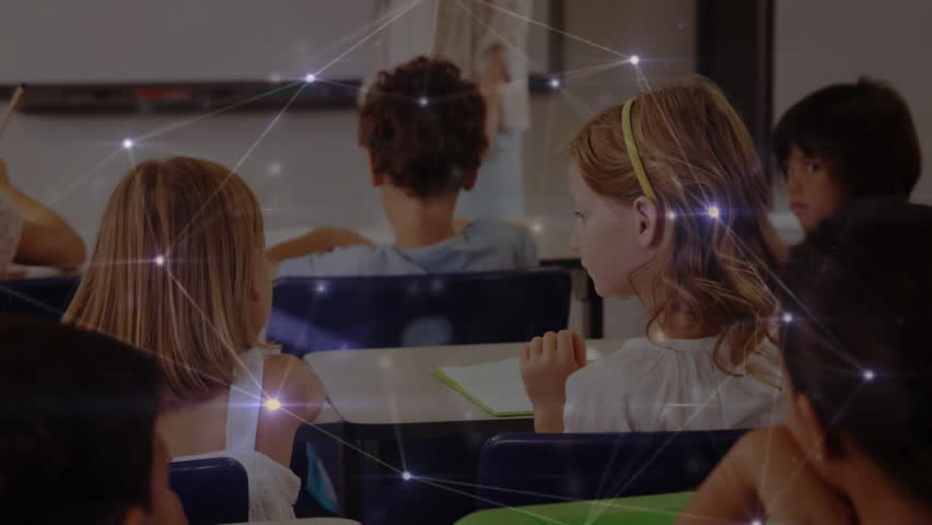 Boy tapping pencil leading yellow headband girl leaning and whispering to neighbor in school class. Students, education, classroom, communication, learning, collaboration, study - Powered by Shutterstock - Get 15% off with code: PIKWIZARD15