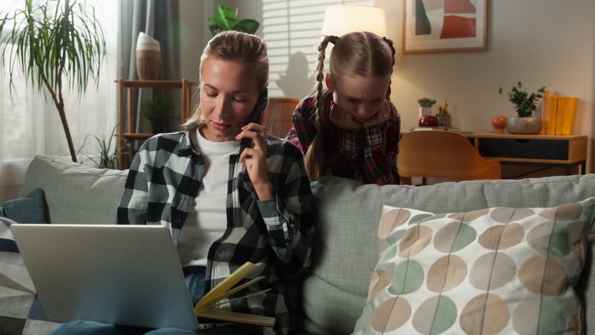 Caucasian family problem busy mother working distant at home ignore offended upset child kid daughter girl need attention sad frustrated woman mom talking mobile phone writing notes childcare trouble