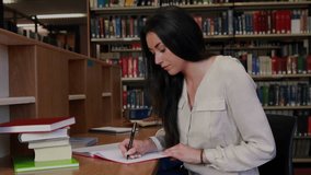 First student entering library taking notes with moving data overlays while second student writing. Study, concentration, data, analysis, collaboration, academic, knowledge - Powered by Shutterstock - Get 15% off with code: PIKWIZARD15