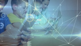 Children tapping tablet screens and activating glowing overlay while woman guiding tech education. Learning, teamwork, innovation, education, digital, collaboration, technology - Powered by Shutterstock - Get 15% off with code: PIKWIZARD15