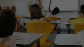 Teacher asking question, student raising hand while smiling and data overlay growing in education. Classroom, education, technology, learning, students, digital, academic - Powered by Shutterstock - Get 15% off with code: PIKWIZARD15