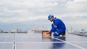 Engineer inspects solar panel system and electric line on industrial rooftop to ensure efficiency and renewable energy generation. - Powered by Shutterstock - Get 15% off with code: PIKWIZARD15