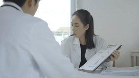 Medical professionals analyzing patient data and collaborating on treatment strategies in a hospital setting - Powered by Shutterstock - Get 15% off with code: PIKWIZARD15