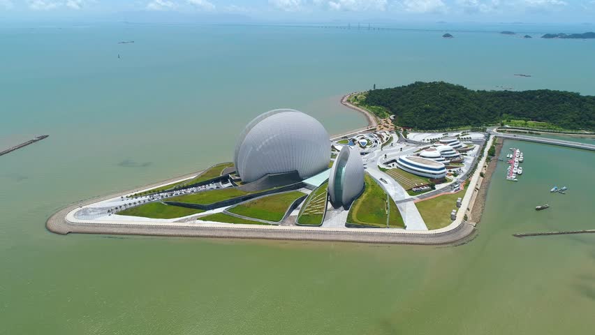 Enjoy a breathtaking view of Zhuhai Opera House along the coast of Guangdong. The futuristic design and beautiful surroundings offer a perfect backdrop for exploration and admiration.