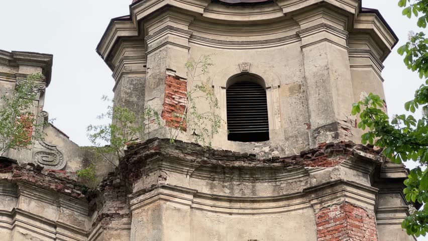 One of the tiers of the main facade of dilapidated Baroque masonry St. Anthony