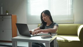 Young adult student studying intensely, closing laptop with evident exhaustion and falling asleep on sofa, representing academic stress and burnout of modern learning - Powered by Shutterstock - Get 15% off with code: PIKWIZARD15