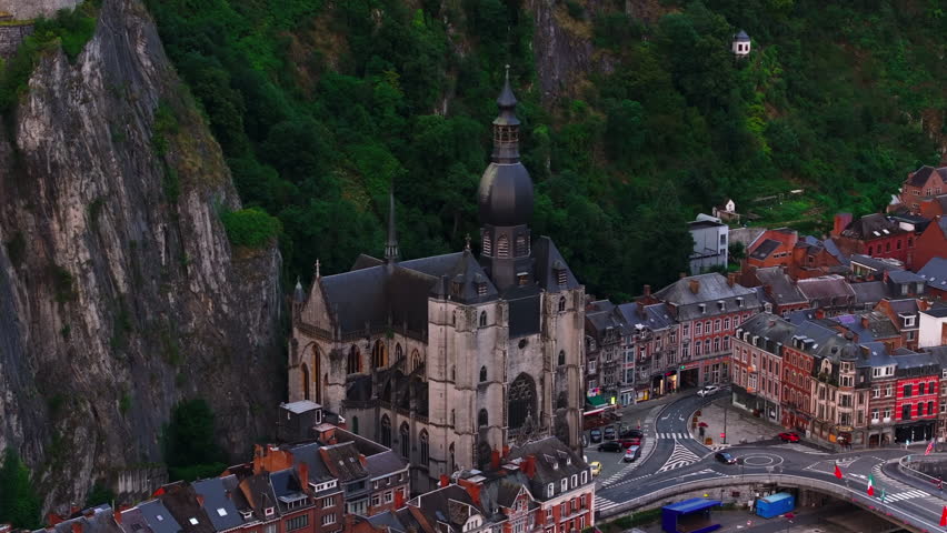 Dinant, a picturesque city along the Meuse river in Belgium, reveals its stunning Collegiate Church of Our Lady and delightful urban scenery from an aerial viewpoint